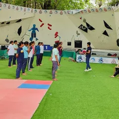 We begin each session by ensuring everyone is aligned and ready. Here, participants line up for instruction at our outdoor training facility, demonstrating the discipline and focus we instill from the very start.