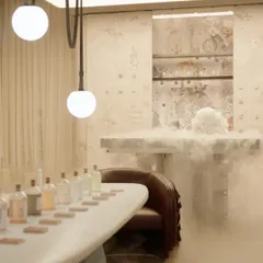 We love adding a touch of drama to our experiential designs. Here, a cloud of smoke adds a layer of mystery and magic to our Mad Hatter's Tea Party installation. This detail, combined with custom lighting and unique furniture, creates an unforgettable, immersive brand experience for visitors.