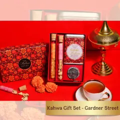 This Kahwa Gift Set is an elegant and unique wedding present. It includes fragrant Kahwa tea, a traditional infuser, and other aromatic spices, all presented in a beautiful floral box.