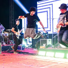 Pure joy and energy on stage. This is the vibe I bring to every show, jumping and jamming with the band to make sure the audience feels every single beat.