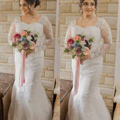 Two full-length shots of Steffi, holding her colorful bouquet. She looks absolutely stunning and ready to walk down the aisle.