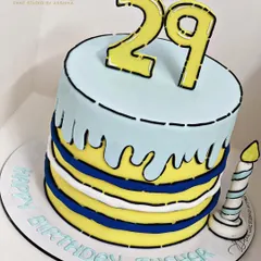 Our take on the viral comic cake trend. This fondant cake is designed to look like a 2D cartoon drawing, with bold black outlines that create a fun, surreal effect.
