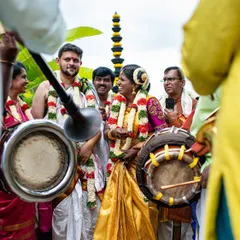 The vibrant sounds of traditional music mark the couple's entrance. I coordinate with all vendors, including musicians, to ensure every part of the wedding day is seamless and memorable.