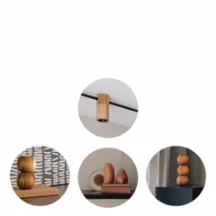 Details make the design. This shows our custom wooden jacket for a track light, and various hand-turned wooden curios. These small, sculptural objects add dimension and personality, layering the space with objects of curiosity.