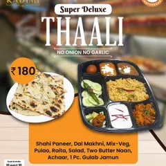The Super Deluxe Thali Experience. A feast for one, our Super Deluxe Thali includes Shahi Paneer, Dal Makhni, Mix-Veg, Pulao, Raita, Butter Naan, and a Gulab Jamun for a sweet finish.