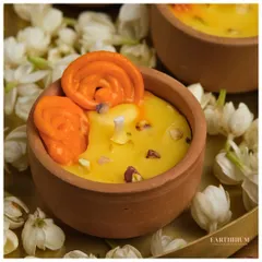 A close-up of my Jalebi & Rabdi Bowl Candle. I pay close attention to detail, from the texture of the "rabdi" wax to the tiny pistachio and saffron details, making it a truly unique decor piece.