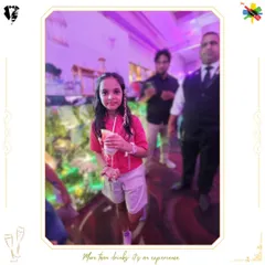 A young guest enjoying her special, kid-friendly mocktail. We ensure our non-alcoholic options are just as exciting and delicious.