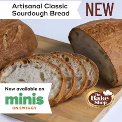 The Artisanal Classic Sourdough Bread has a wonderful tangy flavor and a chewy crust. It's a versatile loaf, perfect for any meal.
