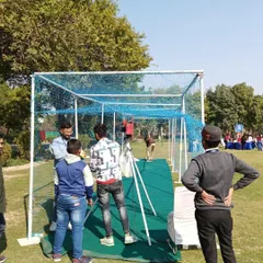 A full view of the cricket net and bowling machine setup, a unique rental item that always attracts a crowd.