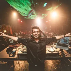Arms open wide, embracing the incredible vibe from the Thane crowd. The visuals on the screen behind me added another layer to the immersive experience.