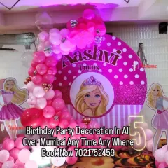 For the ultimate Barbie fan, I created this fabulous pink-themed birthday decoration. The setup includes a sparkling backdrop with Barbie's silhouette, life-sized cutouts, and a balloon arrangement in shades of pink and white.