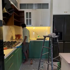 A kitchen in the middle of its glow-up. The cabinets are in, the marble is up, and the appliances are waiting. This is the exciting phase where the space starts to take shape.