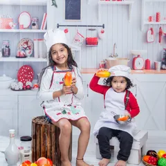 These two sisters are having a blast as little chefs in this fun, themed photoshoot. Sibling sessions are a wonderful way to capture their relationship and create a lasting memory.