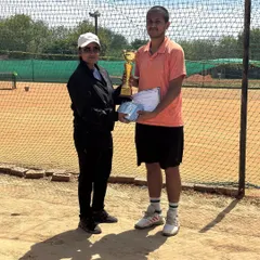 Harshit Yadav, the winner of our monthly prize money tournament, receives his trophy and prize. These events offer cash prizes and gear worth up to Rs 15,000.