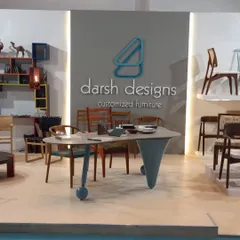 Our booth at the IDAC exhibition, ready for visitors on Day 1. We showcased a variety of our custom chairs and a unique table design to give people a taste of what we can do.
