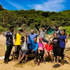 Happy faces on the beach during the Gokarna trek. The combination of hiking and coastal scenery makes this a unique and popular trip.