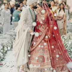 A quiet moment of affection amidst the ceremony. For me, capturing these unscripted gestures is just as important as the grand rituals. This is the timeless love story of Kunal and Parul.