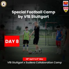 A VfB Stuttgart coach provides one on one guidance to a young player during a special collaboration camp. This personalized attention to technique and form is a core part of our European masterclass, ensuring every player understands the fundamentals at an elite level.