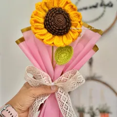 A single, large crochet sunflower makes such a happy and bold statement. It's a perfect, simple gift to show someone you care, and this one is wrapped and ready to bring a smile to someone's face.