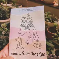 A close up of the anthology 'Voices from the Edge.' The cover art is as creative as the poetry inside. We take great care in designing our books to create a beautiful home for your words.