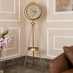 Make every second a statement with our gold-finish standing clock. It features a mesmerizing moving gear mechanism and a sleek tripod base with a small shelf, blending classic craftsmanship with modern design.