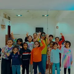 A happy, candid group photo with our students. We believe in the motto, "I don't want people who want to dance, I want people who have to dance."