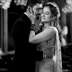 An intimate embrace, captured in classic black and white. The soft lighting and genuine emotion between Sanket and Ruchi make this Sangeet portrait timeless.