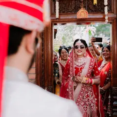 The groom's first look at his bride. We focus on capturing these unscripted, emotional moments, preserving the genuine surprise and joy of the wedding day as they naturally unfold.