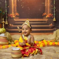 Look at this adorable little Krishna! I love creating special themed photoshoots, especially for festivals like Janmashtami. We can bring any creative vision to life for your baby's portraits.