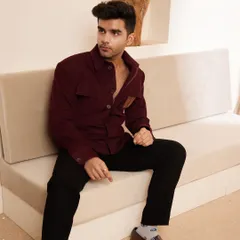 This image captures the relaxed yet polished vibe of our maroon shacket. It's the ideal layering piece for a cool evening or a smart casual event.