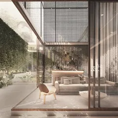 In the House of Veils, even entertainment spaces are connected to the outdoors. This bar area is defined by filtered screens and large glass panels that look out onto a verdant, private garden.