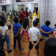 Here, our campers are fully engaged in a group activity, learning to collaborate and communicate with each other. These fun-filled sessions are crucial for developing social skills and teamwork.