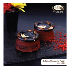 Our Belgian Chocolate Pastry is pure indulgence, featuring a rich chocolate mousse and a glossy ganache topping.
