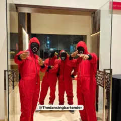Red light, green light... tequila shot! Our team dressed in Squid Game costumes for a themed after-party, because why not? We love committing to a theme.