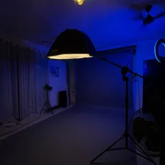 A glimpse of our Greater Noida studio setup at night. We use professional-grade lighting, like this Godox softbox, to create the perfect mood for your portraits.