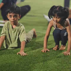 Two of our youngest members practicing their form together. We foster a supportive environment where kids can learn and grow.