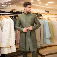 A perfect blend of tradition and trend. This olive green layered Indo-western outfit features unique textural details, making it a sophisticated choice for a reception or cocktail night.