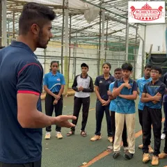 Aman Khan interacting with our girls' team, offering them tips and motivation. We ensure all our players, boys and girls, get access to mentorship from top professionals.