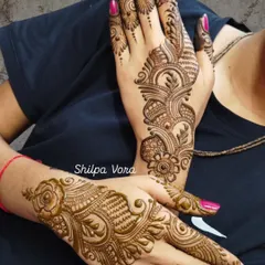 Two different Arabic-style designs, showing the versatility of this beautiful, flowing art form.