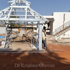 The "before" shot of a gazebo project. This shows the basic metal framework before any of the finishing or landscape work has begun.