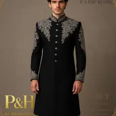 A detailed view of the intricate silver hand-embroidery on the black Indo-Western suit. Each motif is carefully placed to enhance the garment's sharp tailoring and luxurious feel.