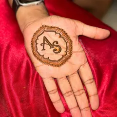 Another look at the popular initials design for grooms. It's a timeless choice that is both personal and stylish.