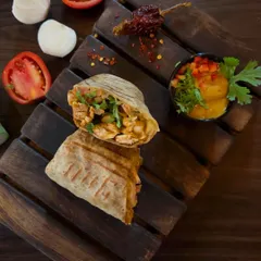 Another look at the delicious Spicy Tandoori Wrap, filled with tandoori-flavored protein and fresh veggies. It's a flavor explosion in every bite.