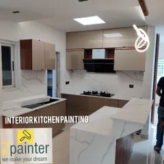 Another view of the stylish kitchen, highlighting the clean lines and flawless finish of the surrounding walls.