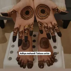 A complete set of matching mehndi for hands and feet. This design features a bold, circular mandala pattern, creating a simple yet striking look for any festive occasion.