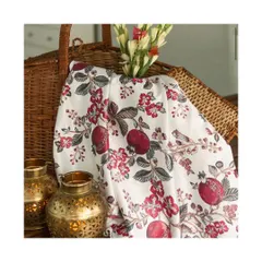 The Glen Snow White fabric from the Forest Story collection features a beautiful pomegranate and floral print. This versatile fabric is perfectly suited for upholstery, bringing a touch of fresh, botanical elegance to furniture.