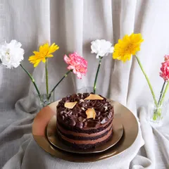 Indulge in the ultimate chocolate hazelnut crunch cake. It features layers of moist goodness and a surprise crunch in every bite that makes it truly special.