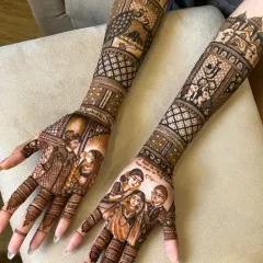 Your mehndi can include your whole family. Here, I created custom portraits of the bride with her loved ones, turning her henna into a cherished memory she can wear.