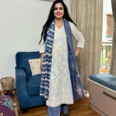 This white chikankari kurta paired with blue palazzo pants and a striped dupatta is a comfortable and stylish look from my May photo dump. It's a great example of mixing and matching different pieces.