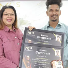 A proud graduate receiving his Diploma Certificates for Ladies Hair Cut and Chemical work. He is now a certified professional, ready for the industry.